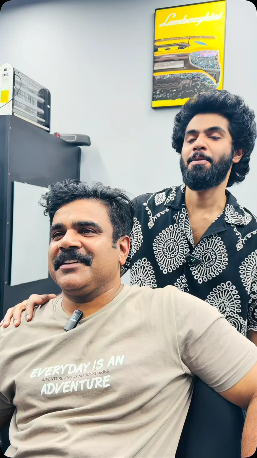 A Cloud Nine regular sharing a happy moment with his barber